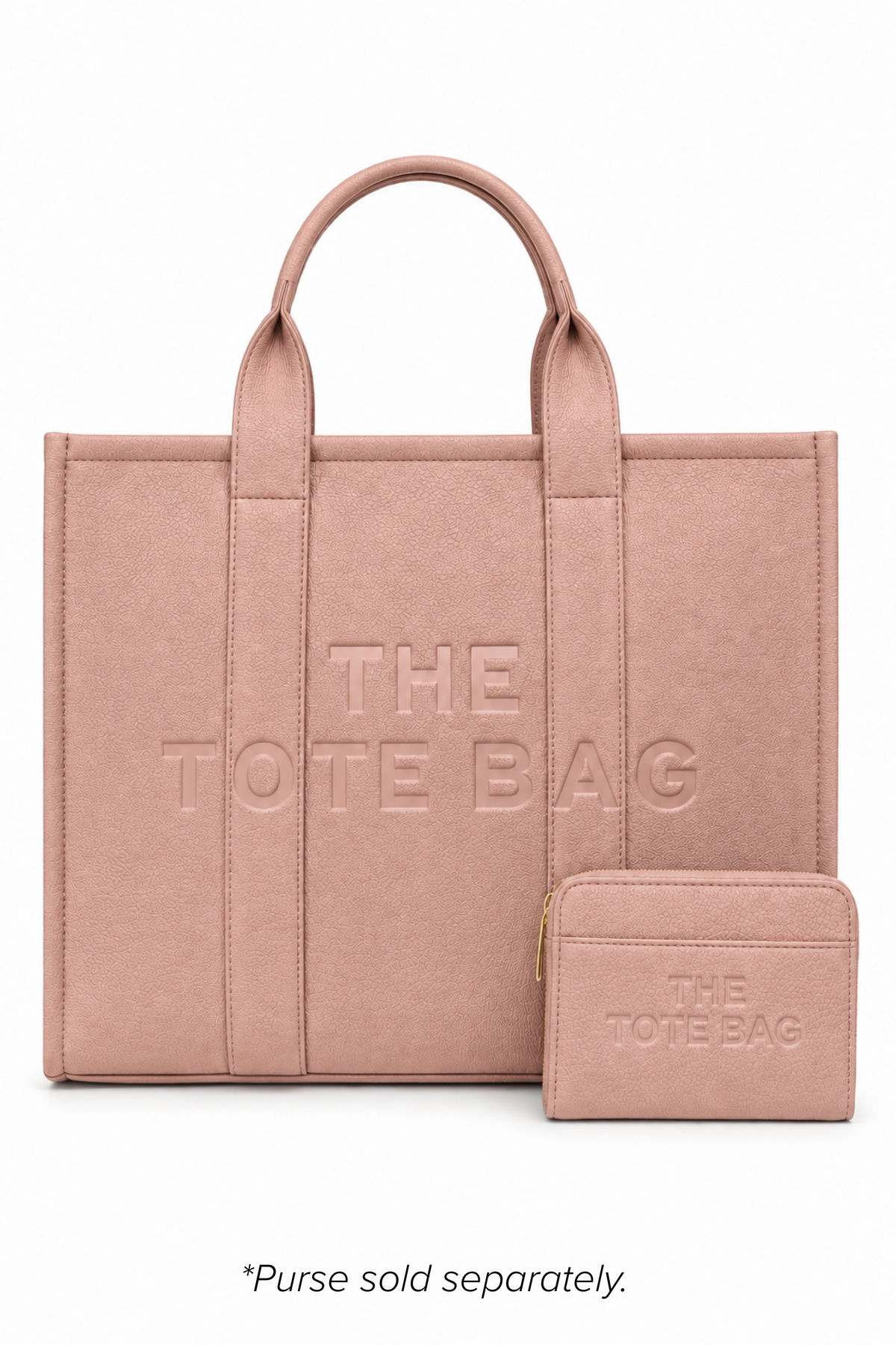 Large faux leather Pink "THE TOTE BAG" lettering on the front, vertical stitched panels, contrast edging. With pink-tone tote purse pictured in front of bag. Purse sold separately.