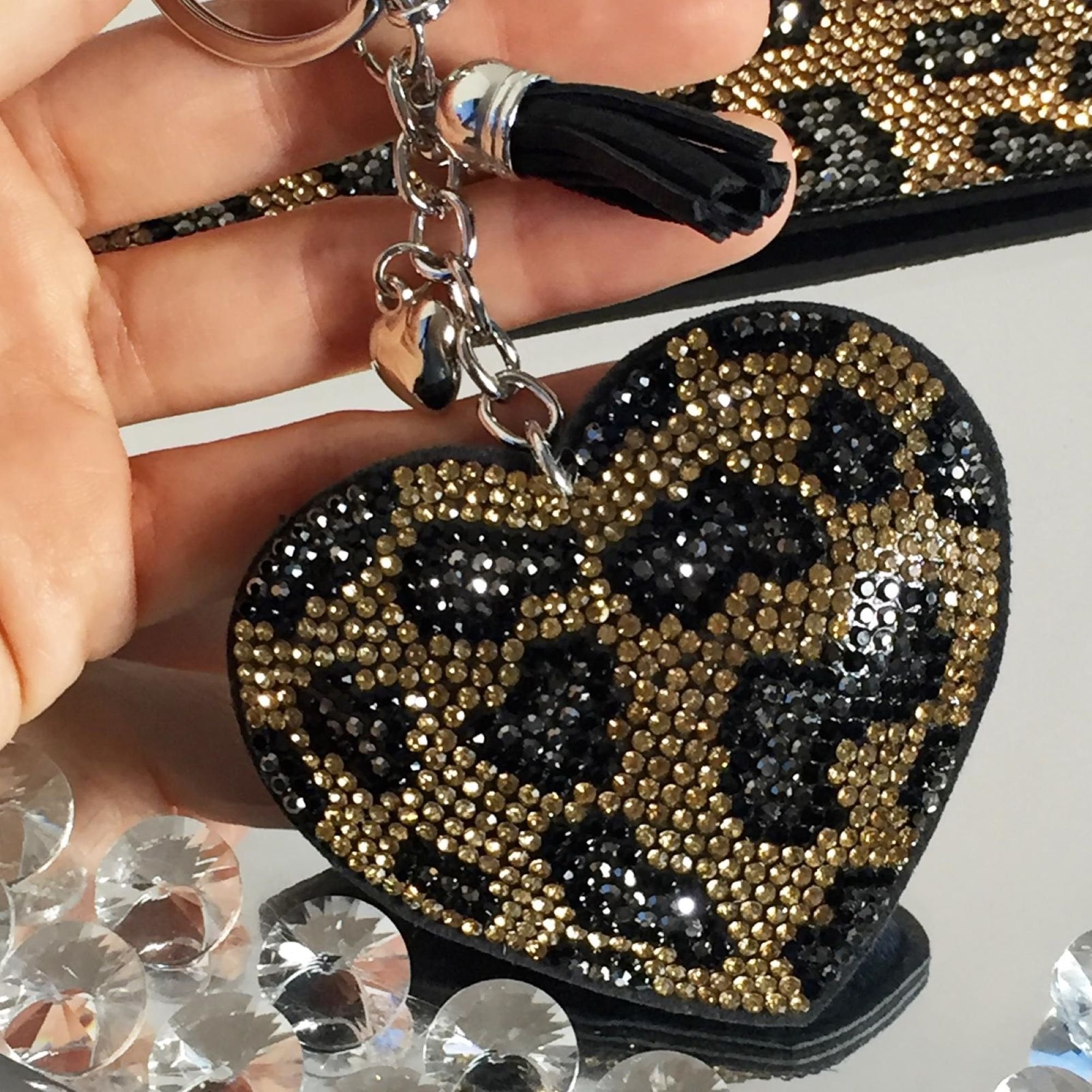 Crystal Padded Heart Keyring Leopard, bringing attention to lightweight