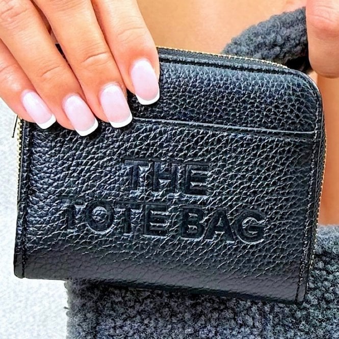 Classic Teddy Medium Tote Grey & Zip Up Tote Bag Purse Black Bundle, capturing a secure zip closure.