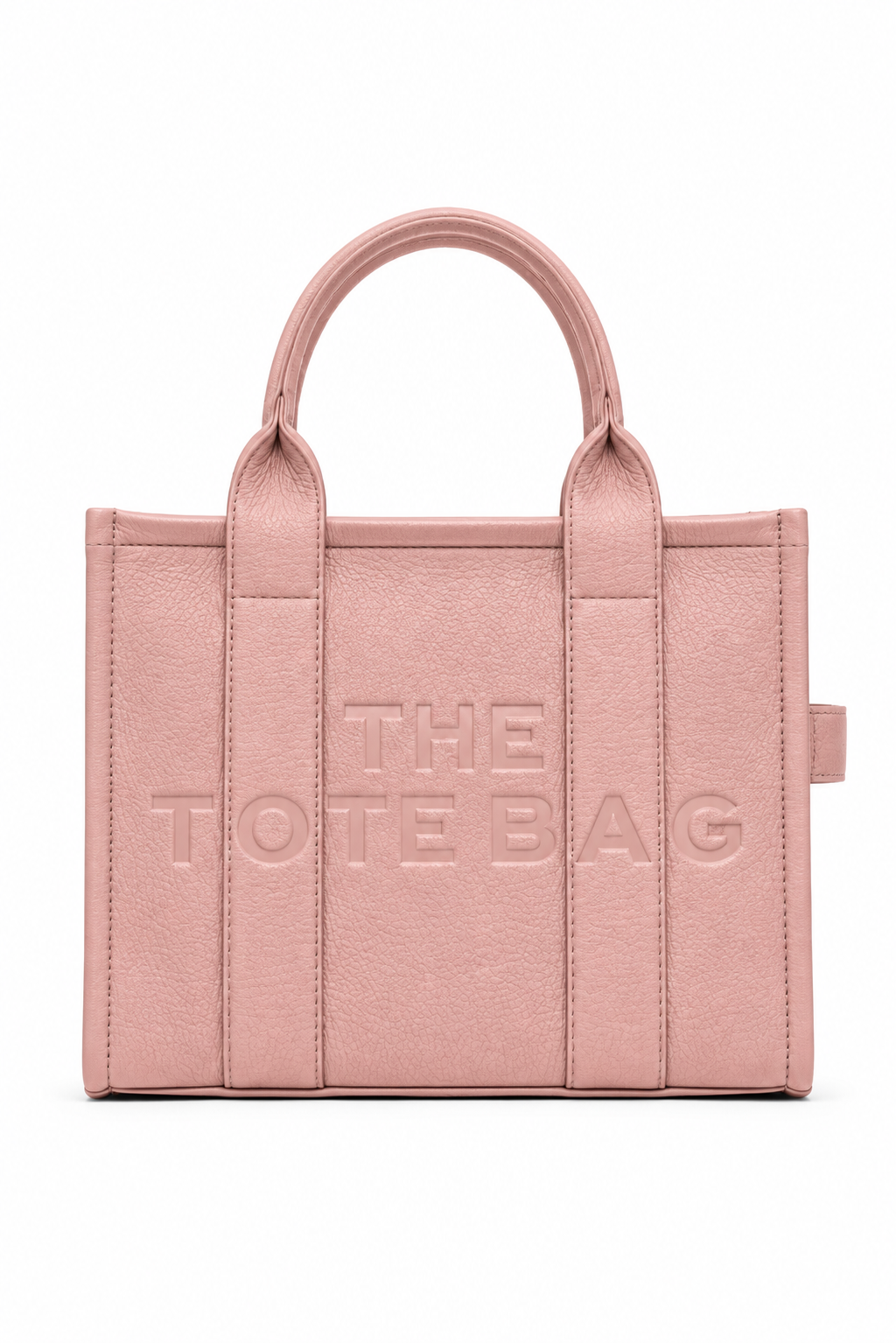Dusty Pink structured Tote bag with two rounded top handles, tonal embossed "THE TOTE BAG" lettering on the front, vertical stitched panels, matching pink stitching and a small side tab detail. White background.