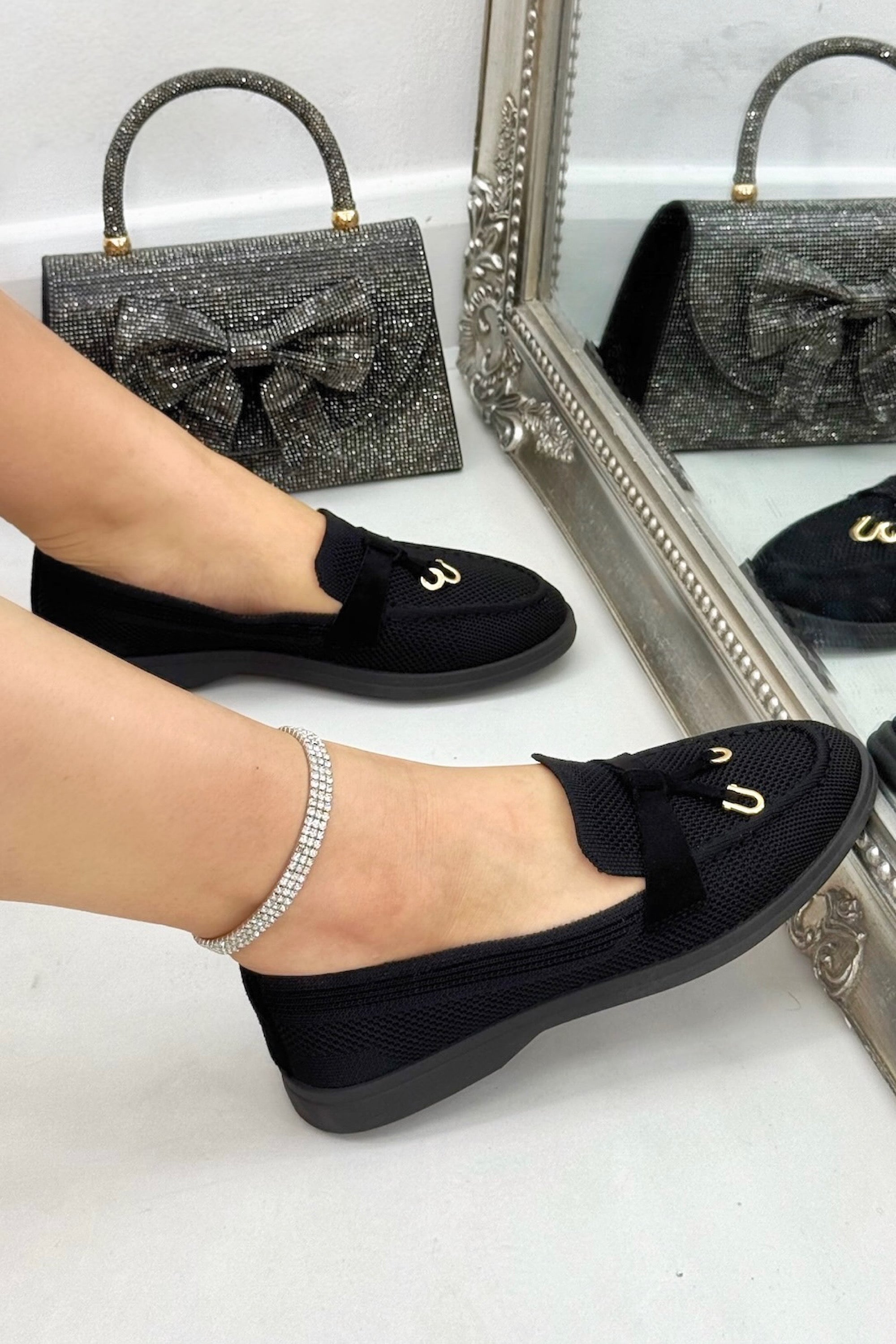 Sparkly Bloom Whisper Slip-On Loafers Black finished with decorative strap with metallic embellishment