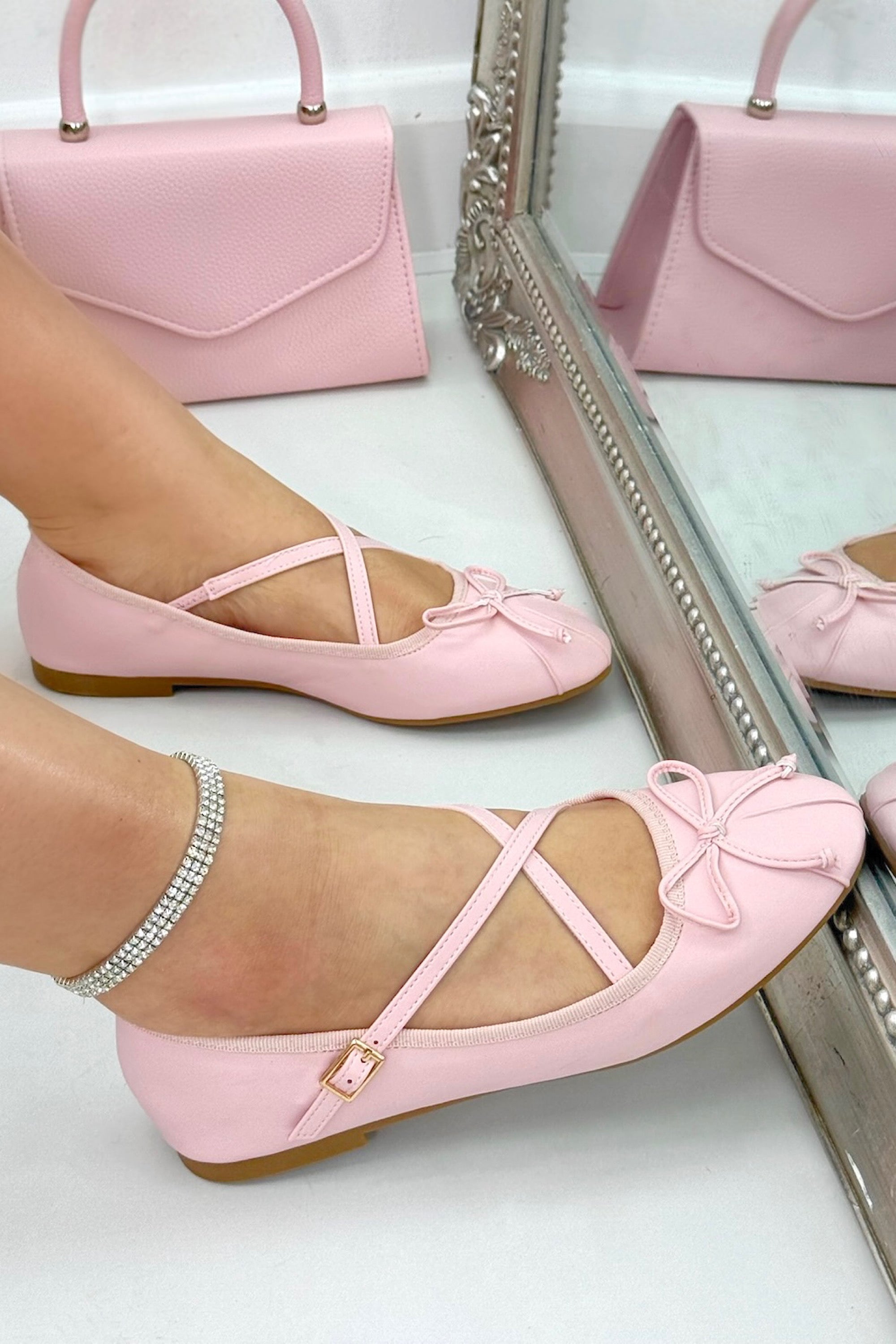 Chic Bow Crisscross Strap Ballet Flats Pink finished with elegant ballet flat silhouette with elegant bow front detail