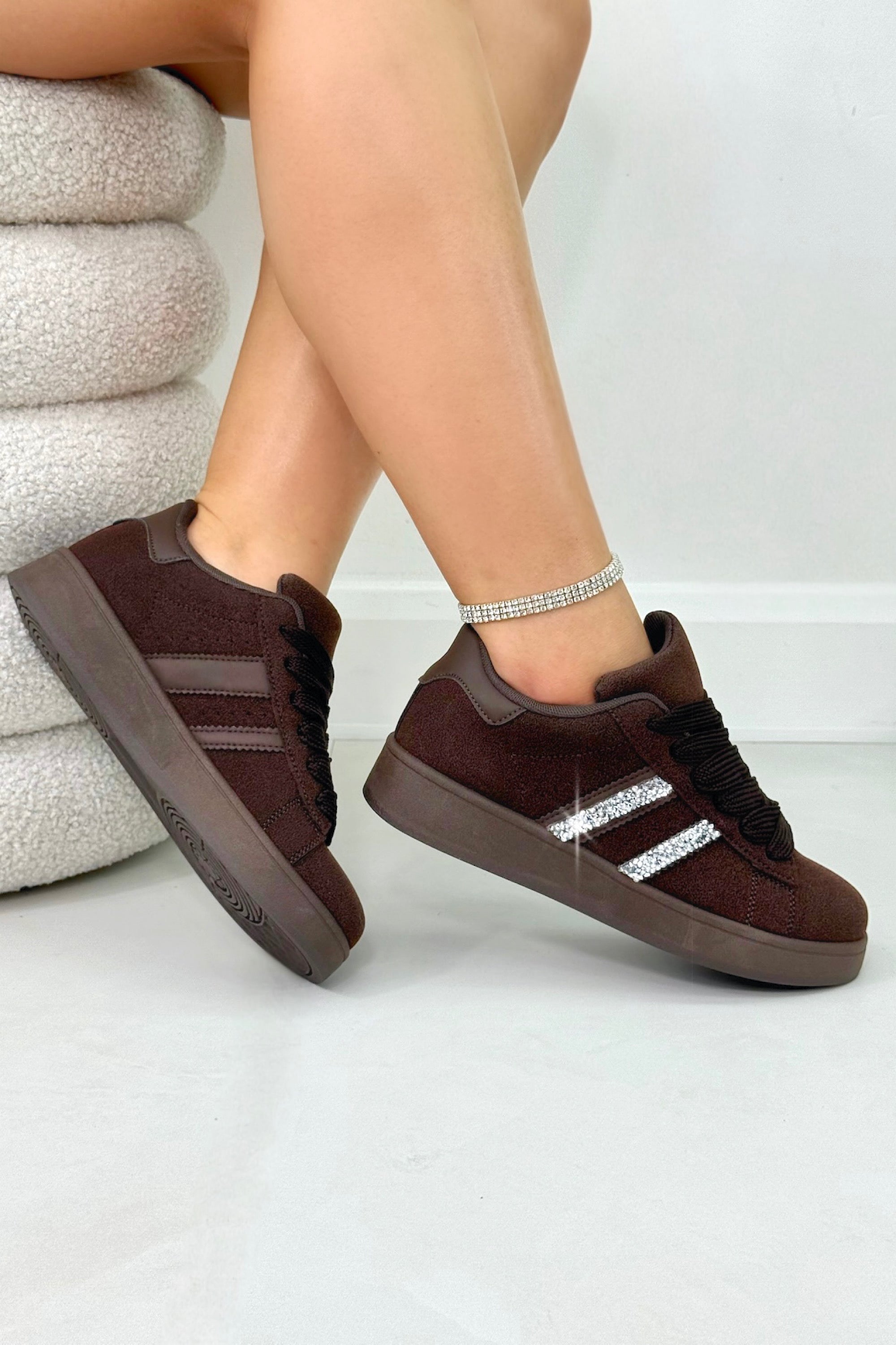 Crystal Stripe Trainers Limited Edition Brown, drawing attention to rubber sole for grip and durability