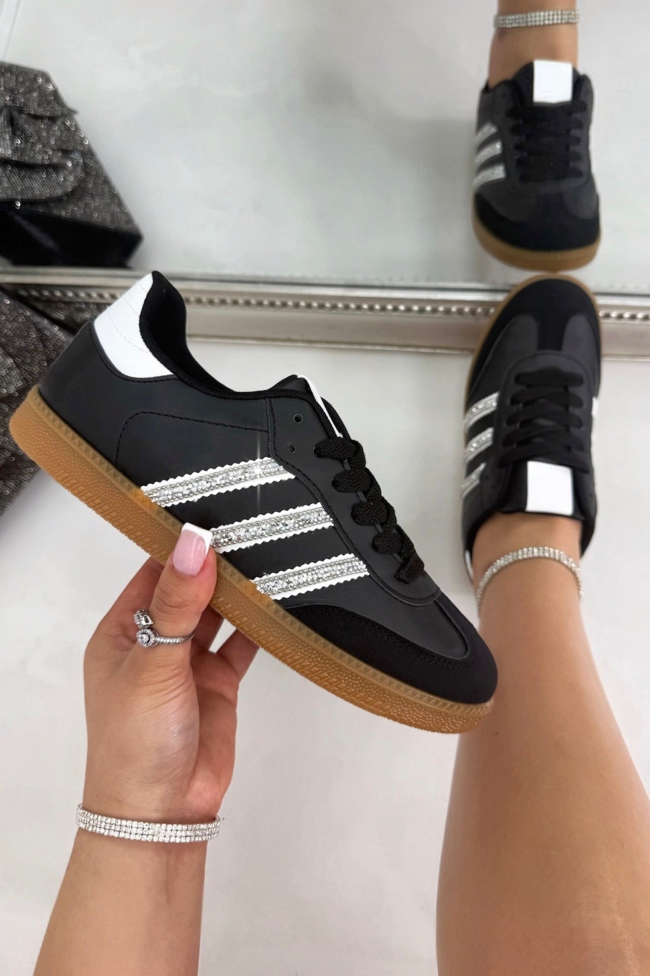 Crystal Stripe Simba Trainers Limited Edition Black, bringing attention to crystal embellished stripe detailing for signature sparkle