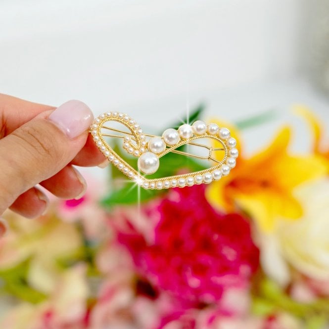 Sparkly Lovestruck Pearl Hair Clip Gold, bringing attention to gold-tone with ivory faux pearls