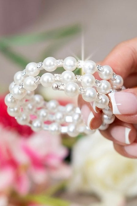Crystal Enchanted Pearl Bangle Bracelet Silver finished with features 3 rows of lustrous pearls and sparkling rhinestone crystals