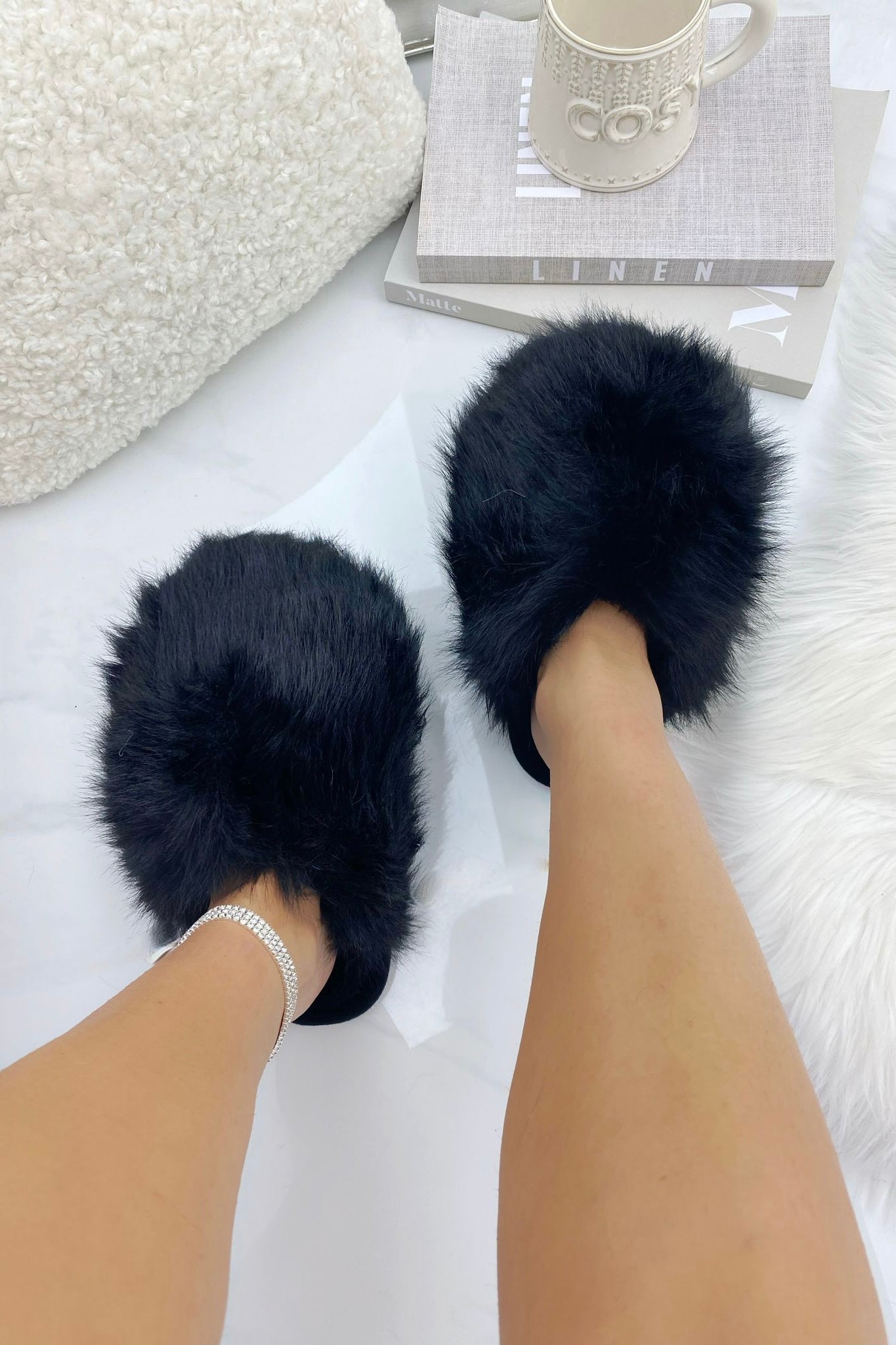Ultimate Cosy Fluffy Slippers Black, bringing attention to faux Fur