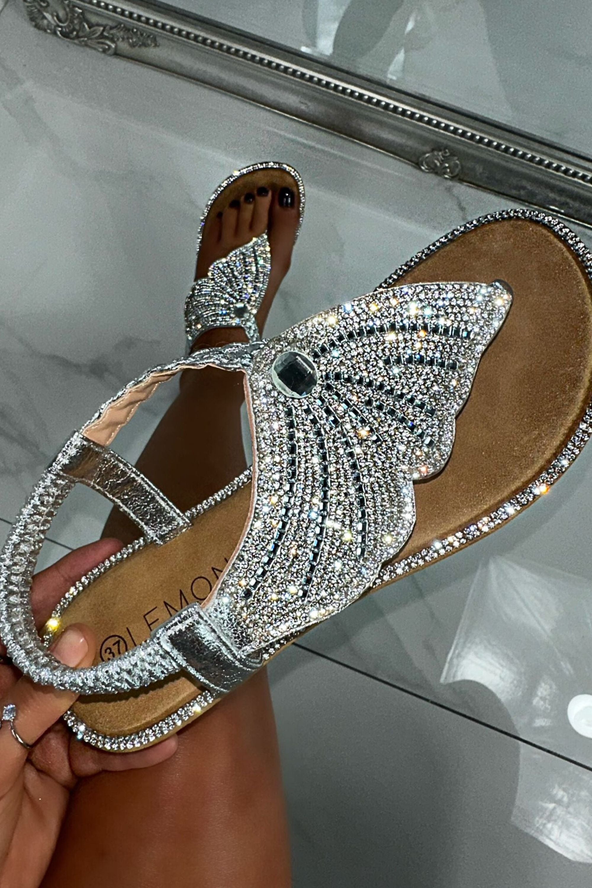 Crystal Couture Butterfly Sandals Silver, focused on toe posts