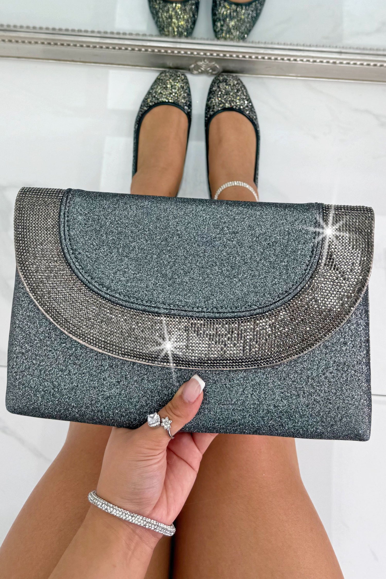 Glitter Luxe Metallic Crystal Envelope Clutch Bag Grey perfect for evening styling with a glamorous metallic shimmer finish.