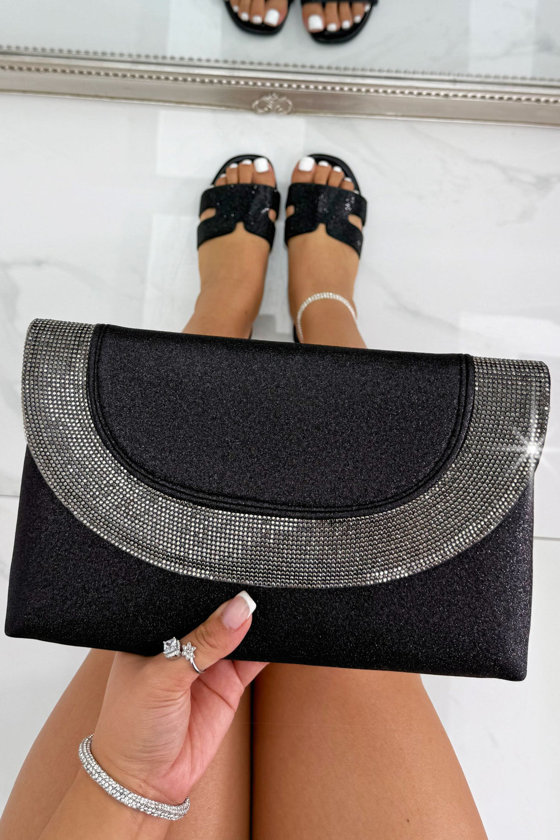 Glitter Luxe Metallic Crystal Envelope Clutch Bag Black showcasing a sleek envelope silhouette with sparkling crystal embellishments.