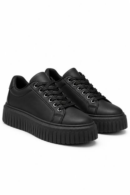 Pair of black sneakers on a white background
