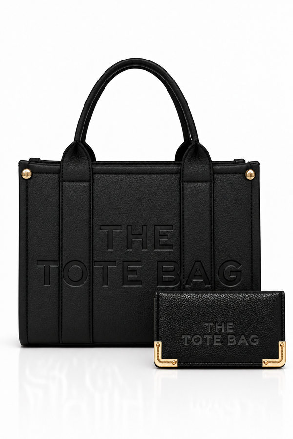 Medium black tote bag with gold “THE TOTE BAG” lettering and matching handles, paired with a black mini purse featuring embossed “THE TOTE BAG” branding. 