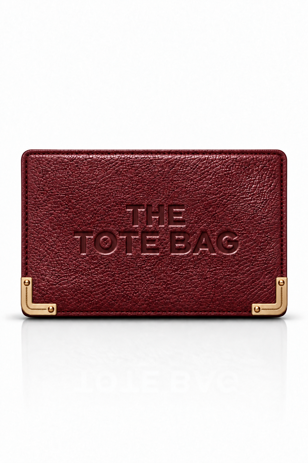 A burgundy textured leather tote bag with gold-tone metal corner brackets and embossed text reading &