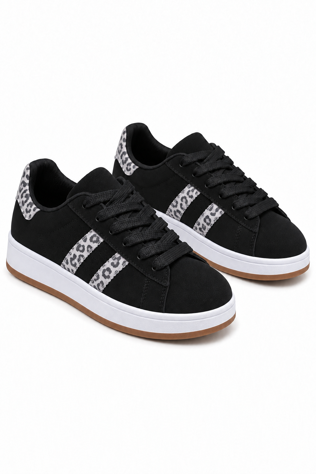 A pair of black low-top sneakers with a leopard print pattern on the side stripes and heel tab, featuring black laces, a white midsole, and a gum brown outsole, shown against a plain white background.