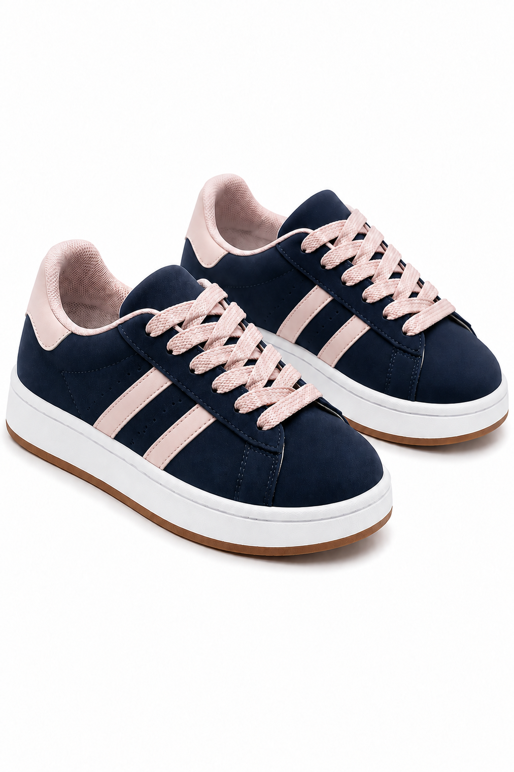 A pair of low-top sneakers in navy blue suede with light pink laces, pink side stripes, and a white midsole, shown on a clean white background.