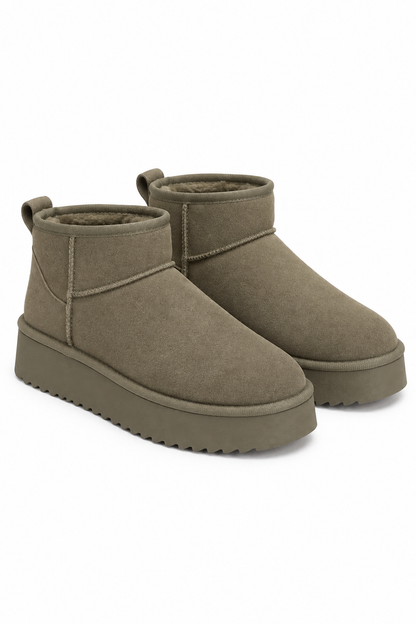 A pair of low-top ankle boots in a muted taupe-brown suede-like material with matching platform soles and a soft lining, shown on a plain white background.