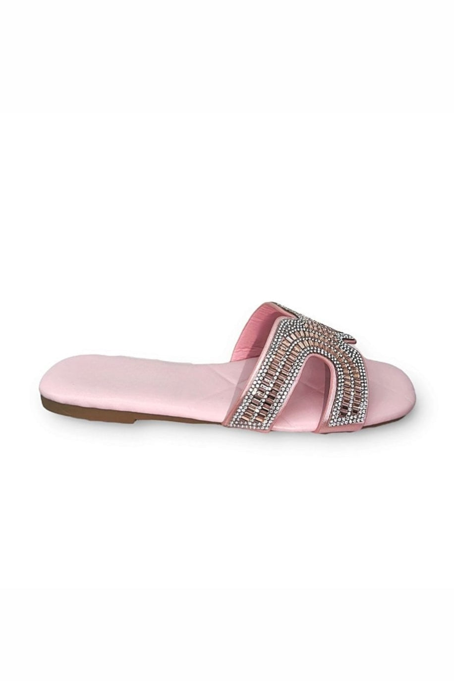 Pink sandal against a white background