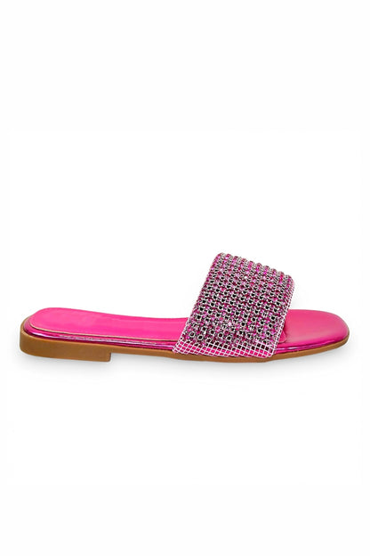 Pink slide sandal with rhinestone strap on a white background