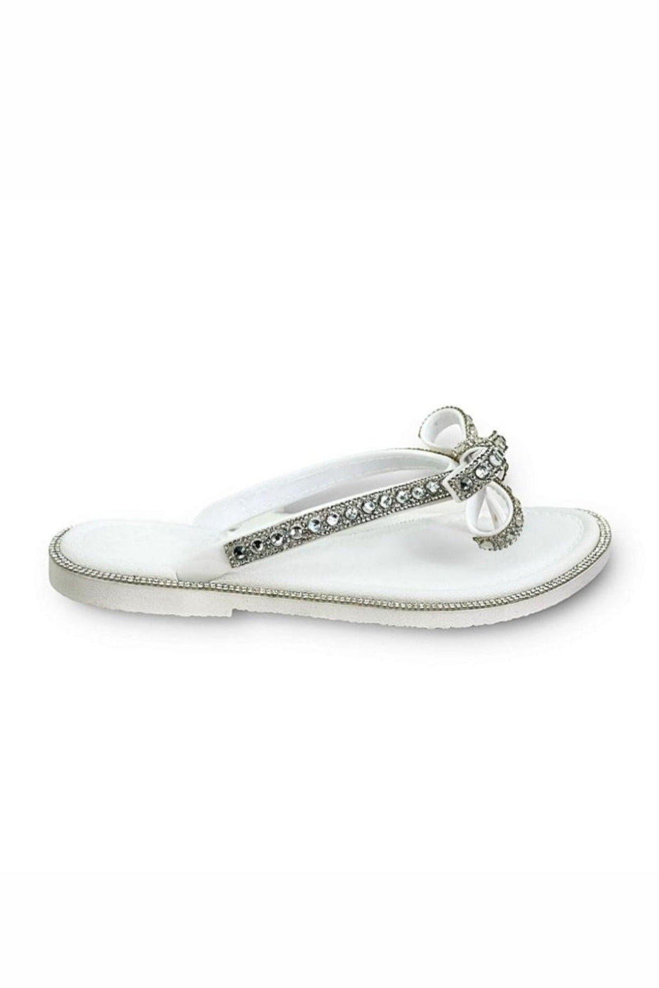 White embellished sparkly sandal against a white background