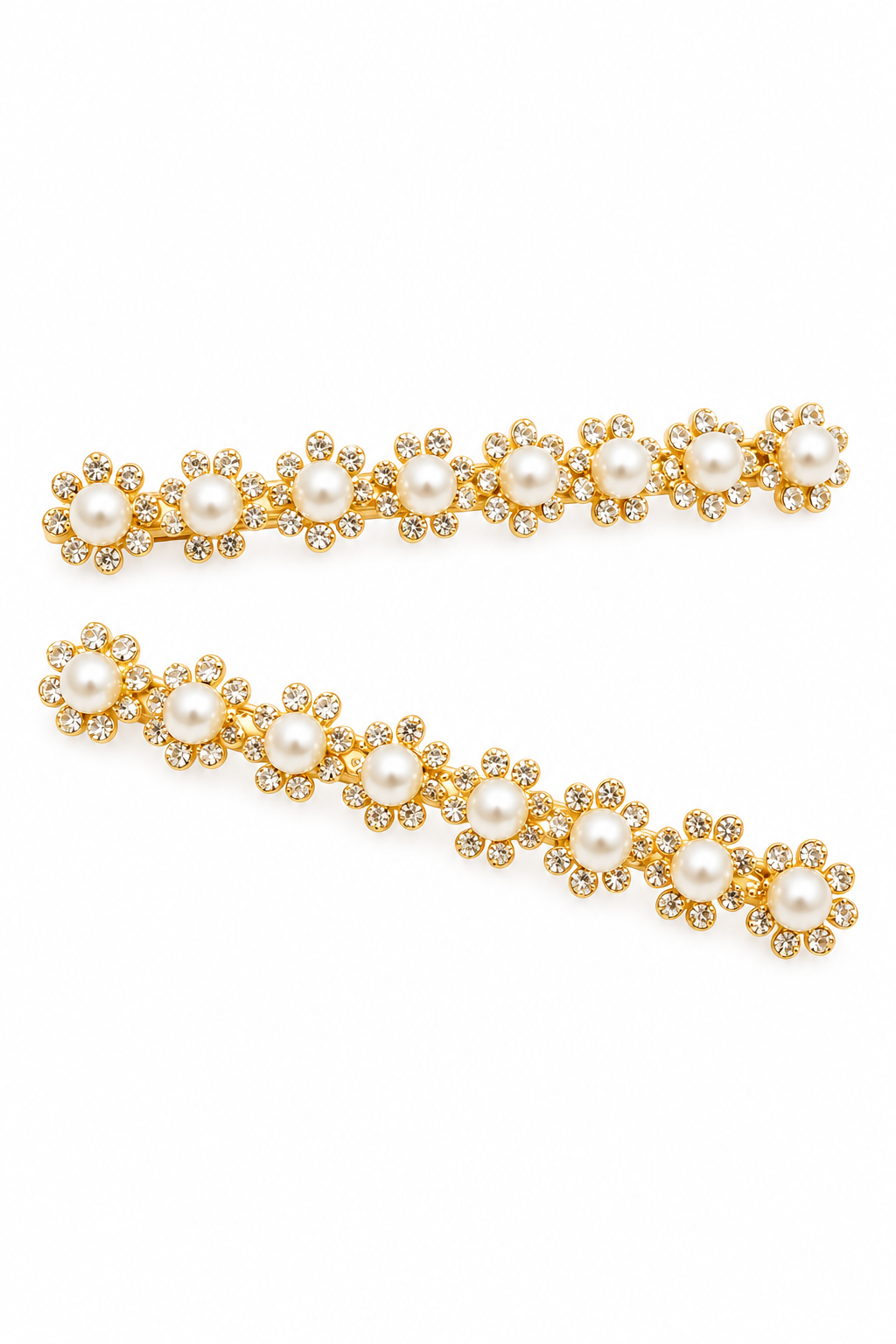 Two gold hair clips decorated with faux pearls and small clear rhinestones in a floral daisy pattern, displayed on a clean white background.