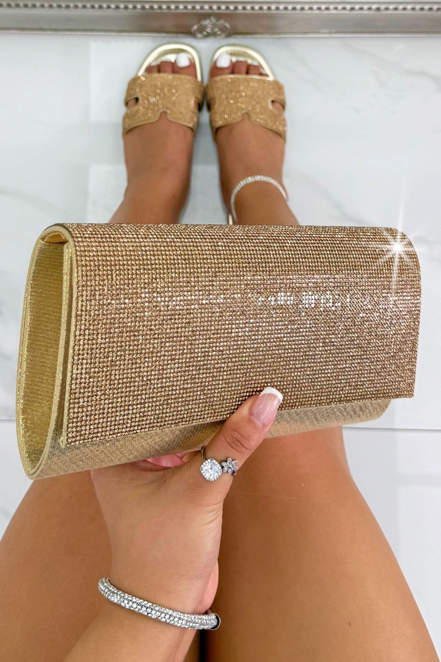 Crystal Sparkle Clutch Bag Gold, showing measurements : Height - 12 cm, Length - 23.3 cm, Width - 5 cm designed to elevate both occasionwear and evening outfits.