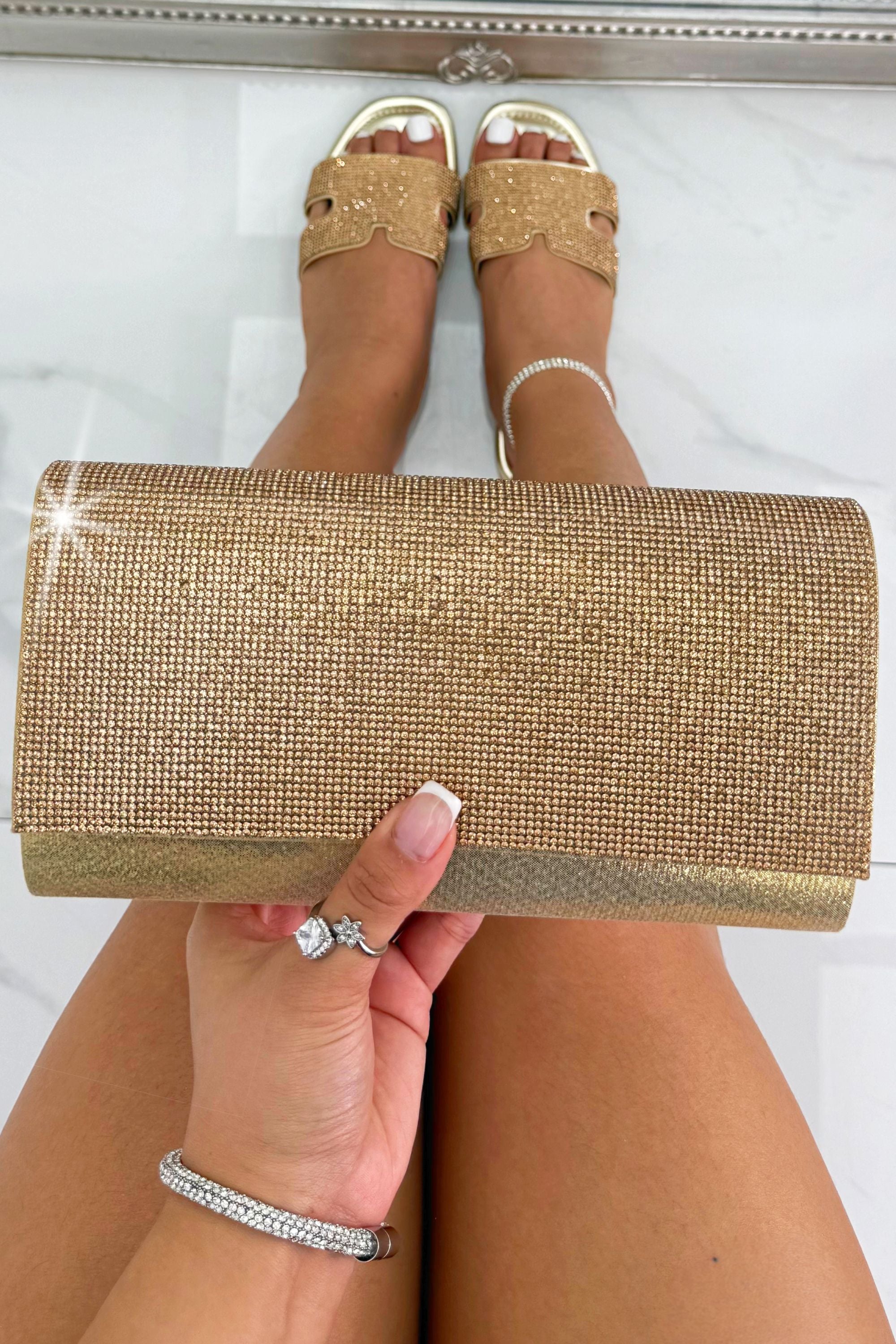 Crystal Sparkle Clutch Bag Gold featuring shimmering sparkle detailing for a glamorous evening finish.