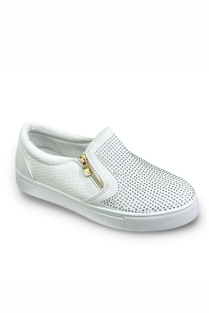 White slip-on sneaker with gold zipper on a white background