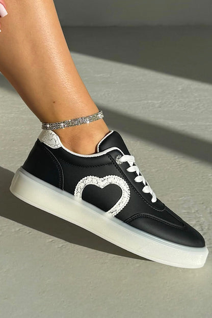 Crystal Cherish Heart Lace-Up Trainers Black, bringing attention to low-profile trainer silhouette