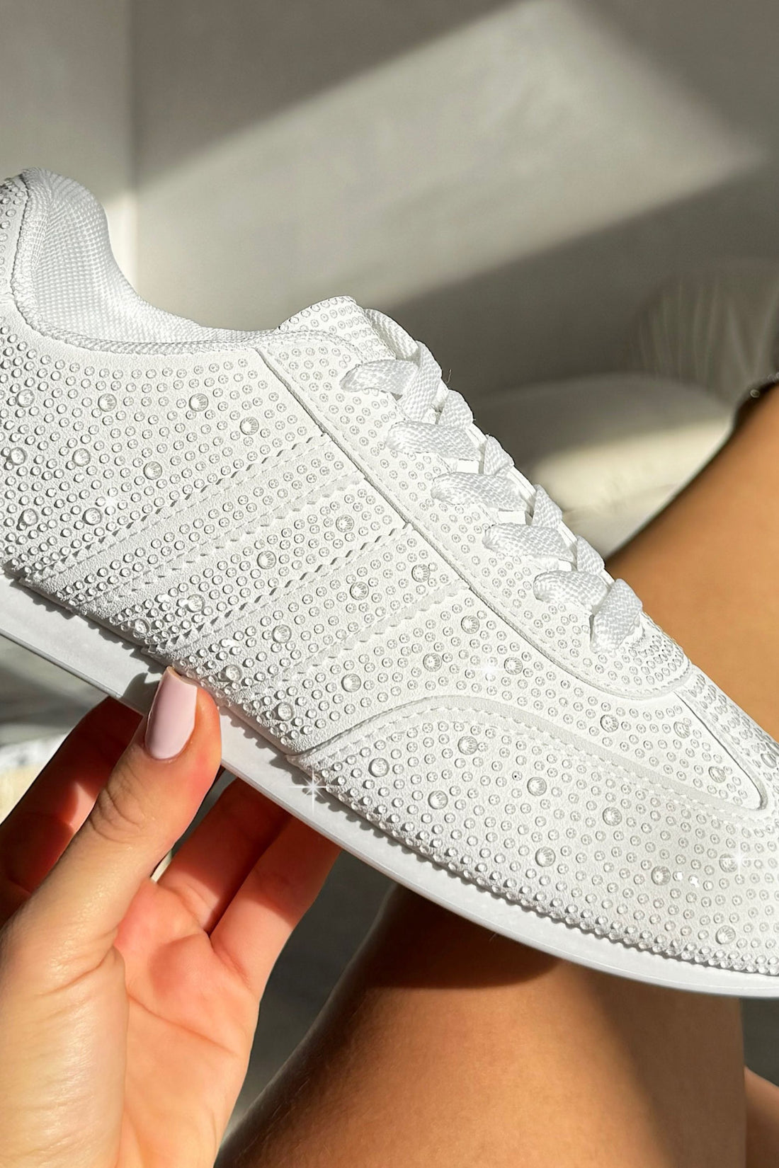 Crystal Dewdrop Lace-Up Trainers White, bringing attention to low-profile trainer silhouette