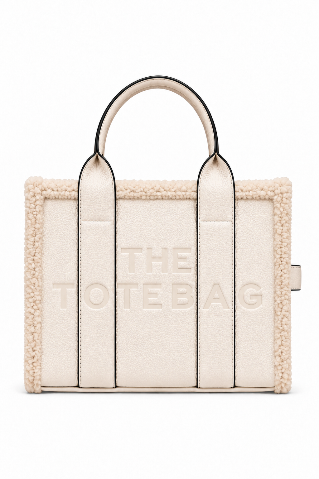 Ivory tote bag featuring a plush cream bouclé trim, structured silhouette, long top handles with black edging, and raised tonal lettering on the front. Set against a white background.