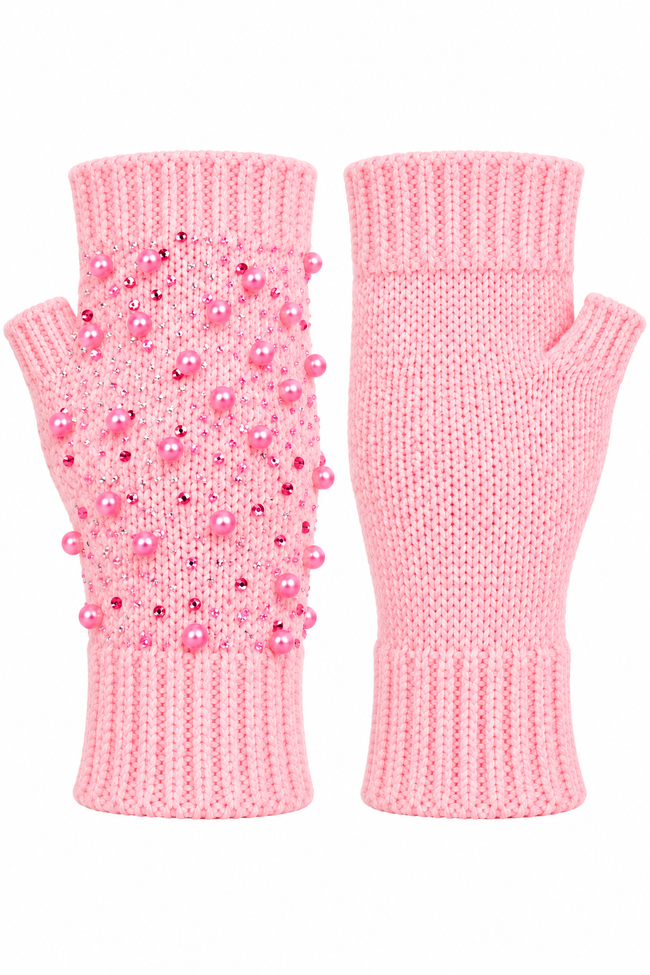 A pair of light pink ribbed knit fingerless gloves, with one glove showing decorative pink faux pearls and rhinestones across the back of the hand.
