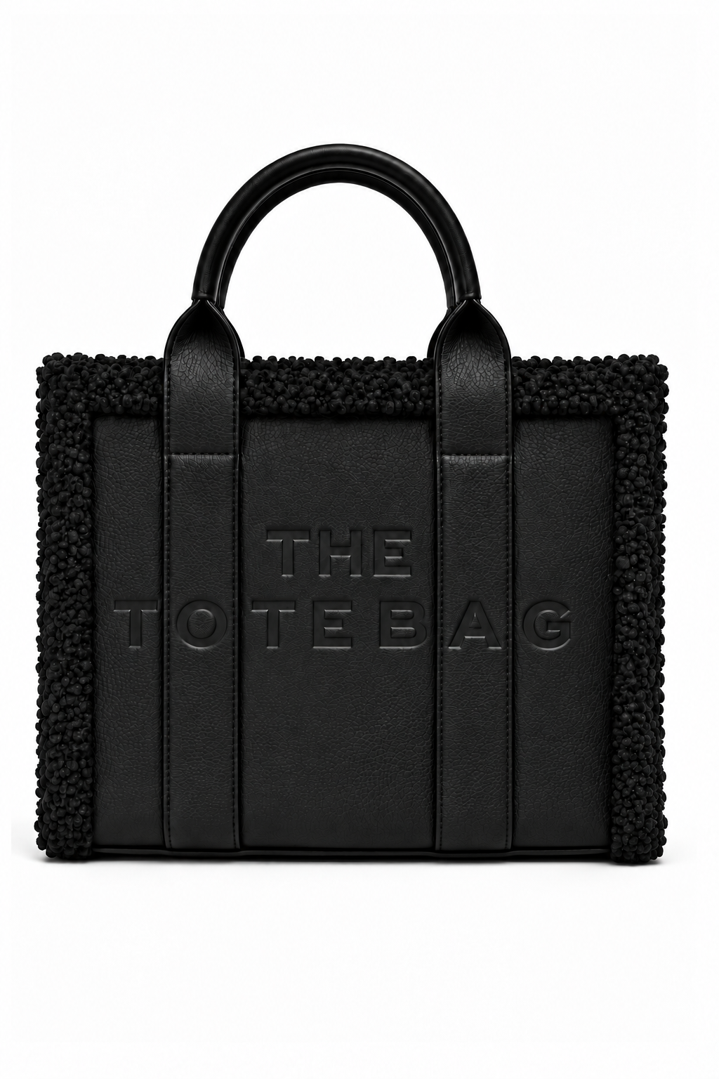 Black tote handbag with structured rectangular shape, rounded top handles, smooth central panels, and a textured black trim along the top and sides. Features embossed, "THE TOTE BAG" lettering on the front and contrasting vertical handle straps. 