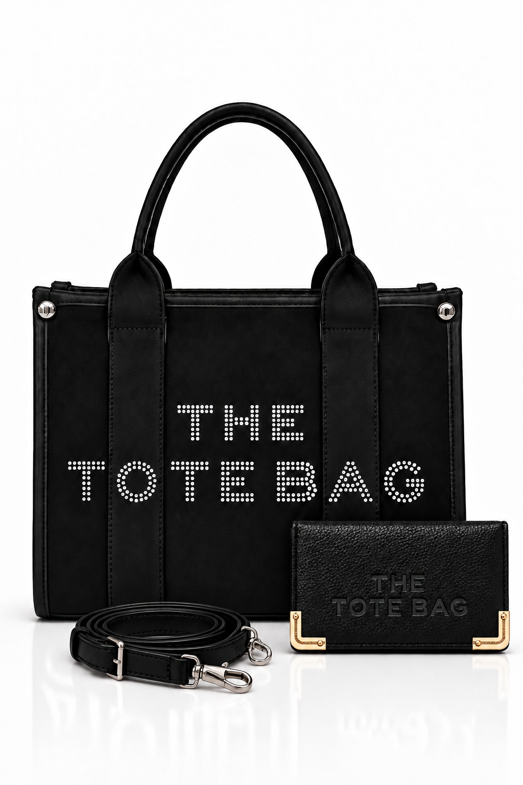 Black, structured tote bag with short rounded handles, textured panel, silver-tone stud details and embellished "THE TOTE BAG" lettering on the front, paired with matching black textured wallet with gold tone corner protectors with a matching shoulder strap.