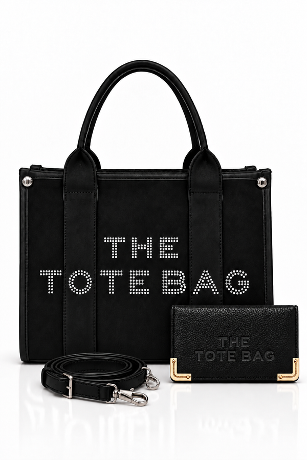 Black, structured tote bag with short rounded handles, textured panel, silver-tone stud details and embellished "THE TOTE BAG" lettering on the front, paired with matching black textured wallet with gold tone corner protectors with a matching shoulder strap.