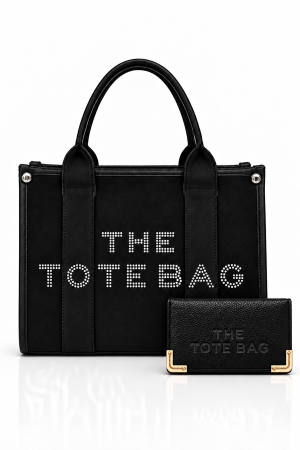 Black, structured tote bag with short rounded handles, textured panel, silver-tone stud details and embellished "THE TOTE BAG" lettering on the front, paired with matching black textured wallet with gold tone corner protectors.