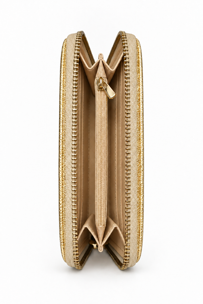 Side view of metallic gold zip-around purse featuring gold tone zipper teeth, a matching gold zip pull and beige accordion- style interior with multiple compartments. 