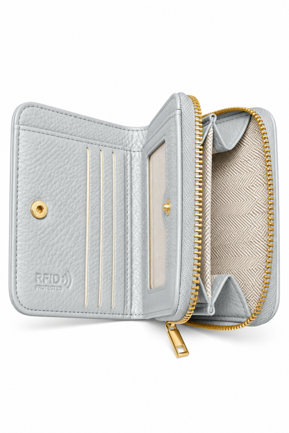Grey textured purse shown open, featuring multiple card slots, a clear ID window, a snap-button closure and spacious zip around coin compartment with beige patterned lining and gold-tone hardware