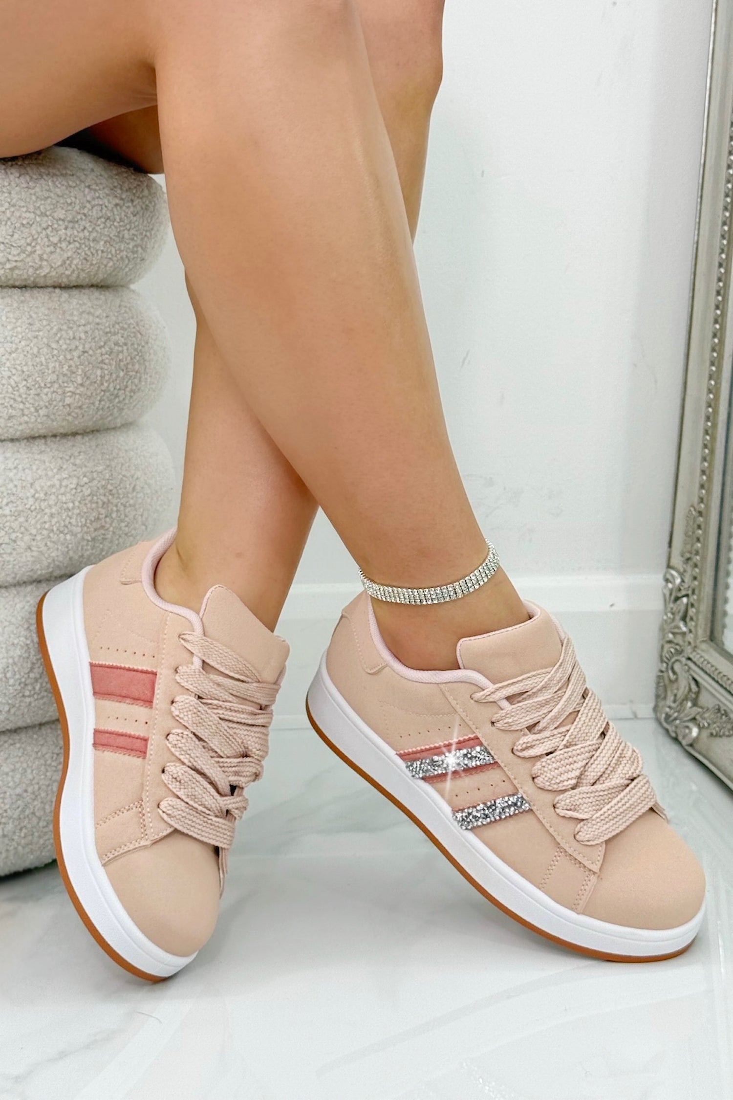 Crystal Stripe Trainers Limited Edition Pink, drawing attention to rubber sole for grip and durability