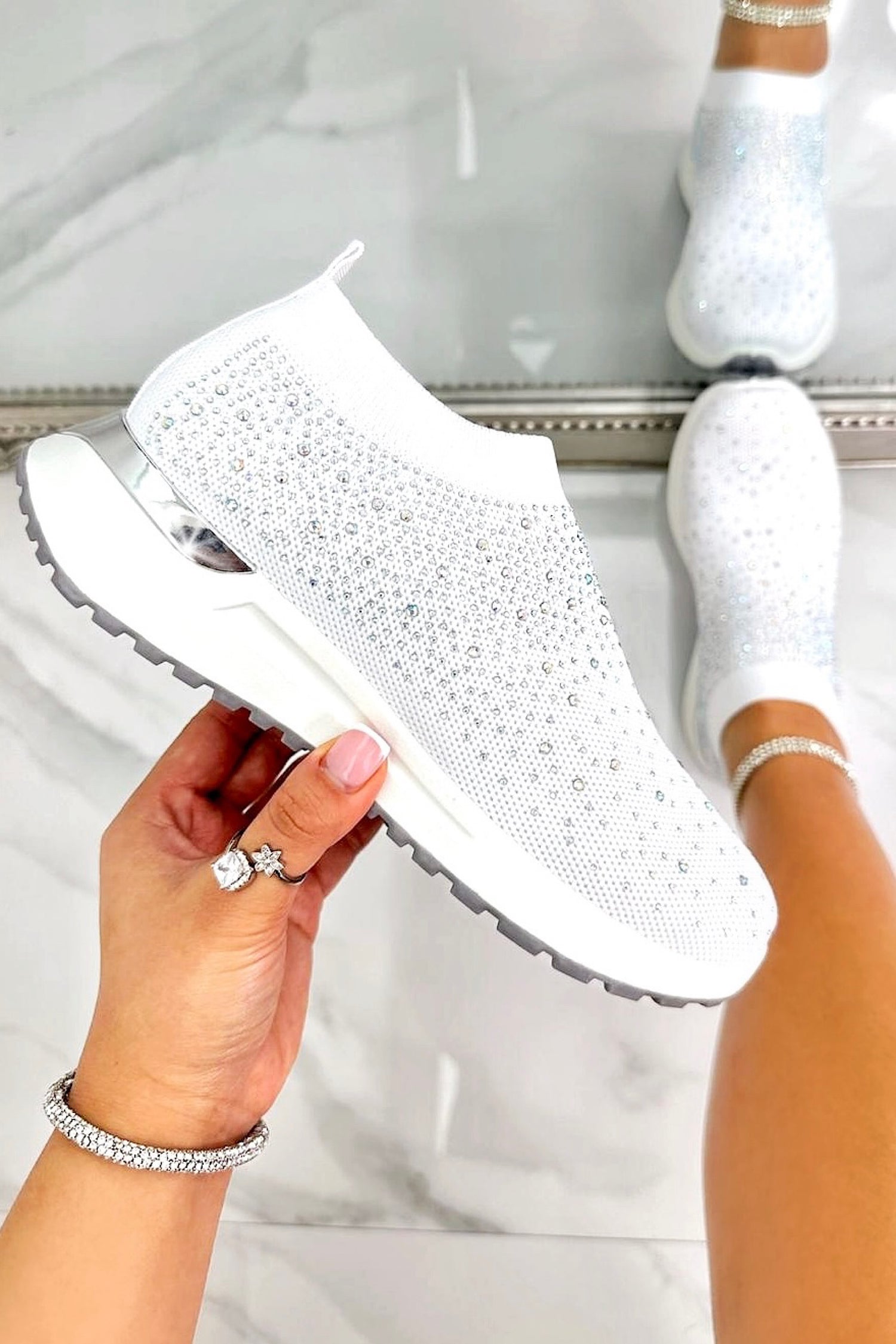 Sparkly Elevate Sculpt Sole Stretch Slip On Trainers White finished with stretch knit upper for a flexible, adaptive fit