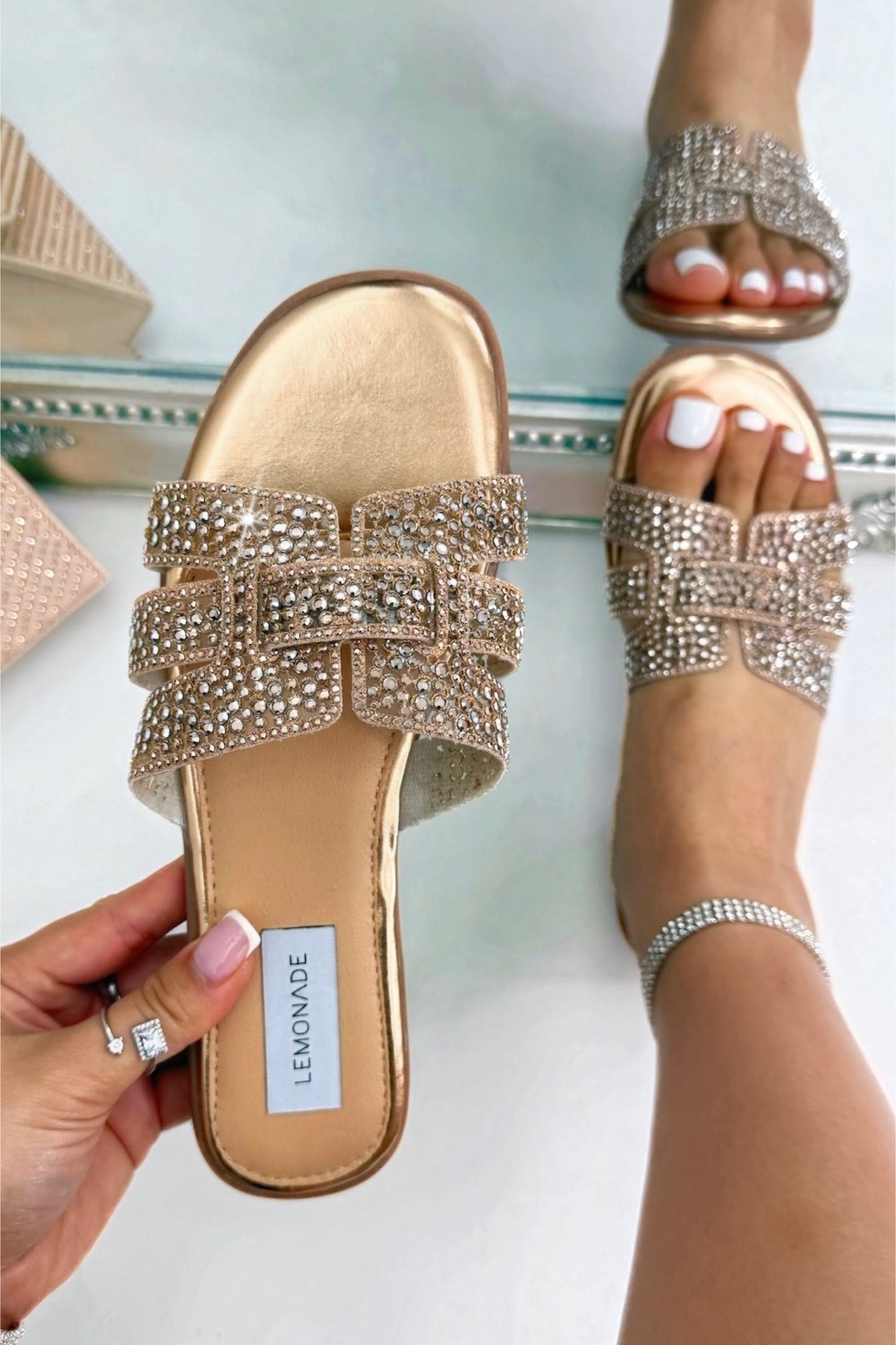 Sparkly Diamond Jelly Sliders Rose Gold, showing slip-on design for easy wear