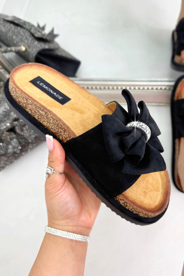 Sparkly Velvet Bow Platform Sliders Black, drawing attention to easy slip-on slider design for effortless everyday wear