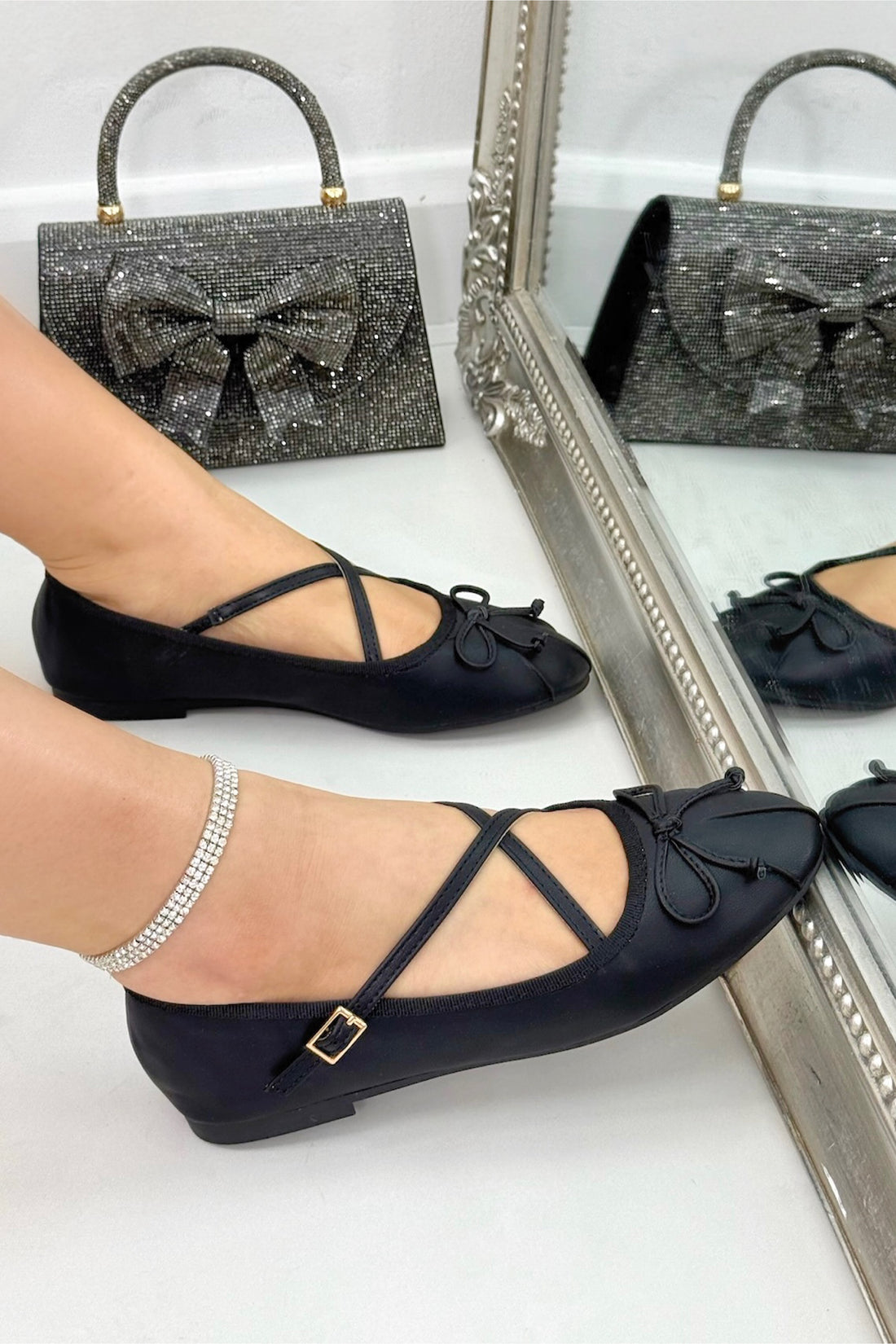 Chic Bow Crisscross Strap Ballet Flats Black designed with elegant ballet flat silhouette with elegant bow front detail