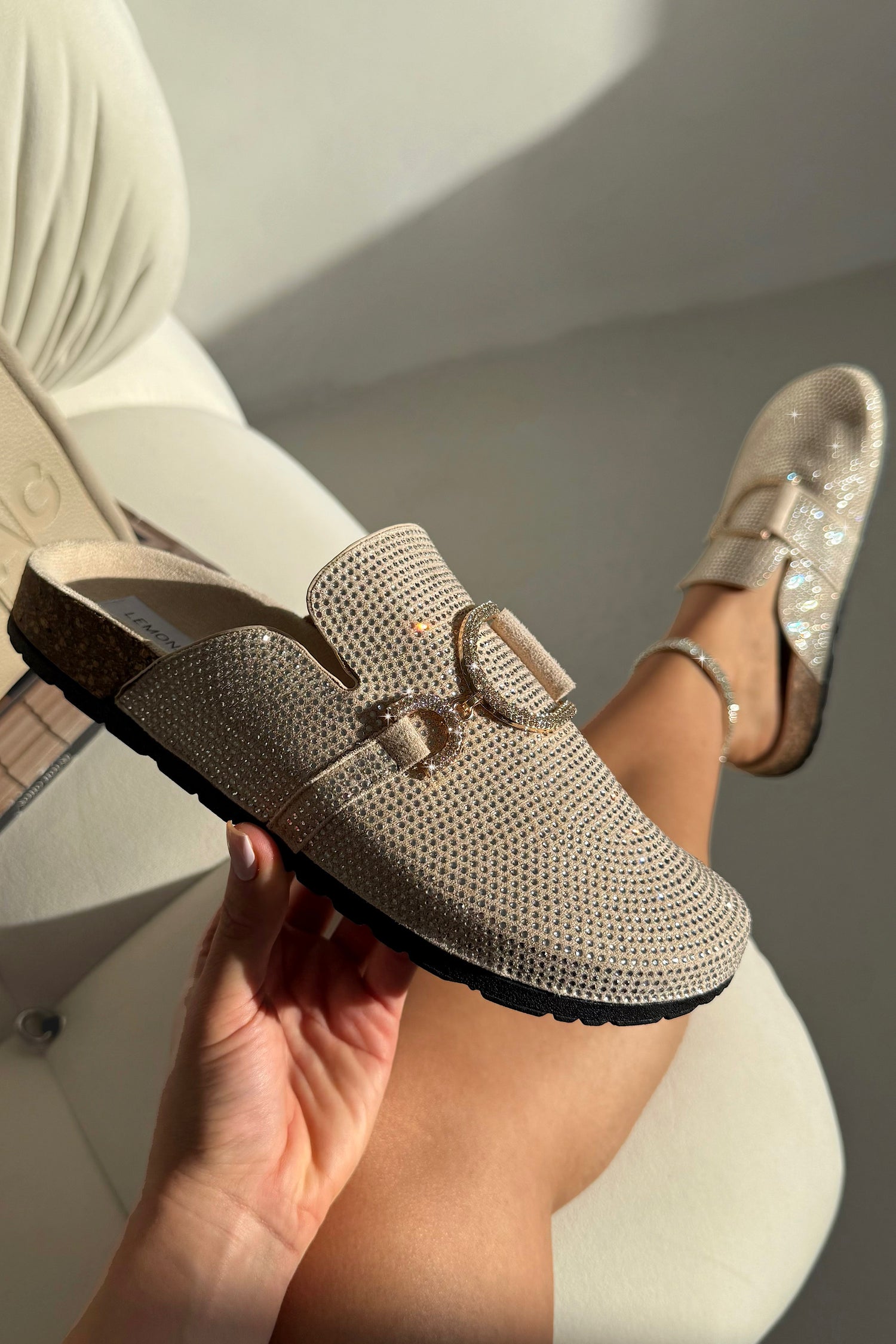 Crystal Imperial Suede Slip On Clog Mules Nude featuring crystal embellished buckle detail