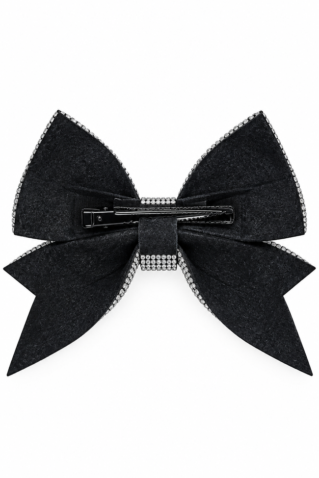 Back view of a hair bow accessory with silver rhinestone trim along the edges and a black metal claw clip in the center, shown against a plain white background.