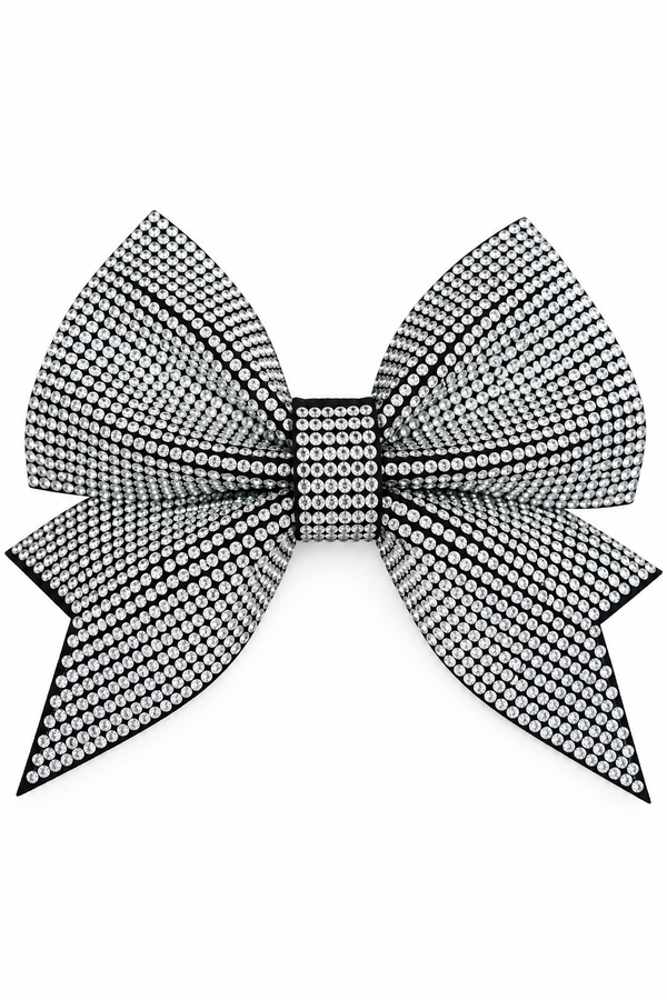A large bow embellished with dense black and silver rhinestones, set against a plain white background.
