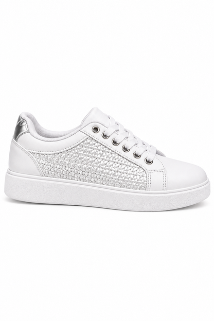 A white low-top sneaker with a textured, woven pattern on the side panel, white laces, and a white sole, shown against a plain white background.