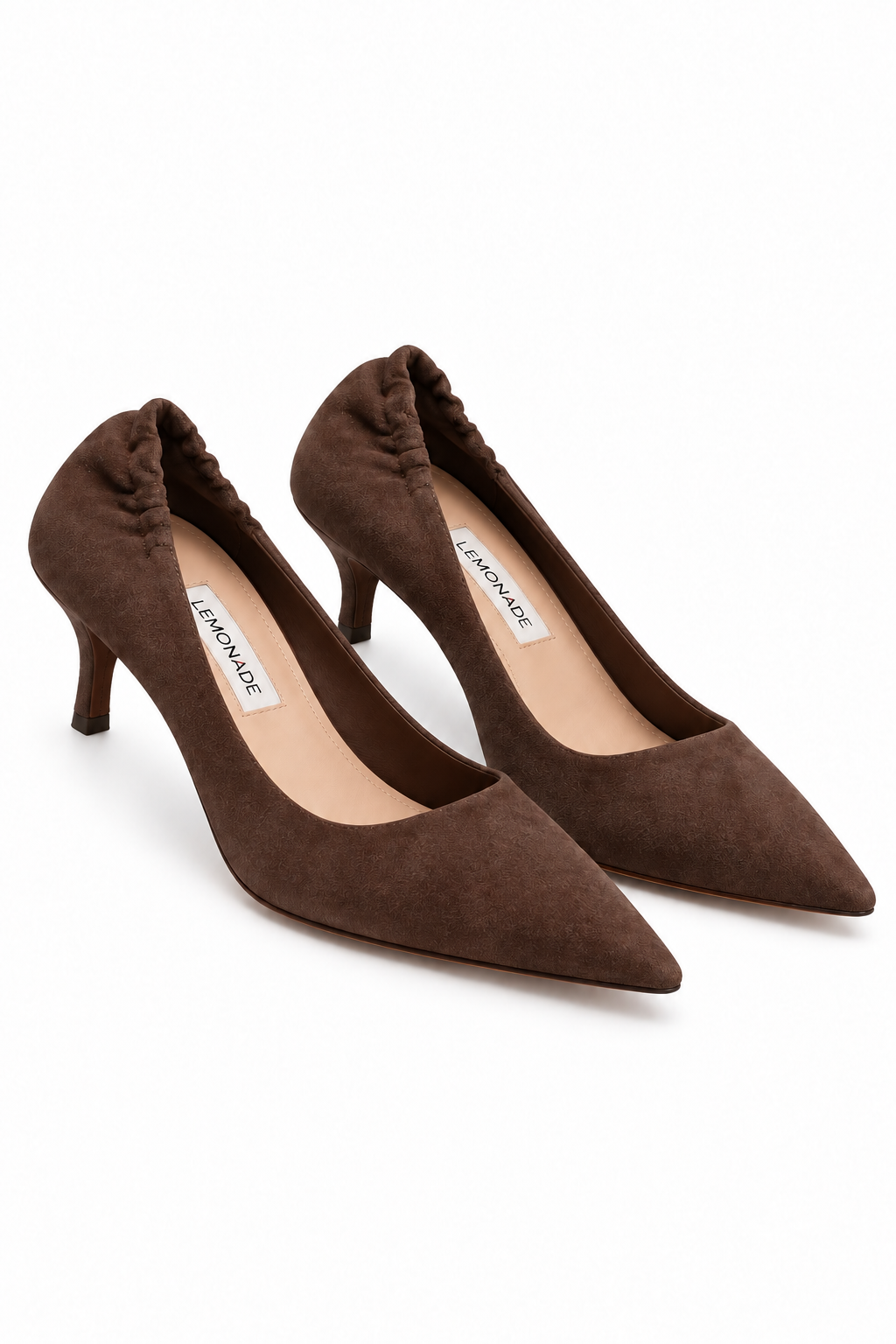 A pair of brown suede pointed-toe pumps with kitten heels, shown on a clean white background. The brand name &