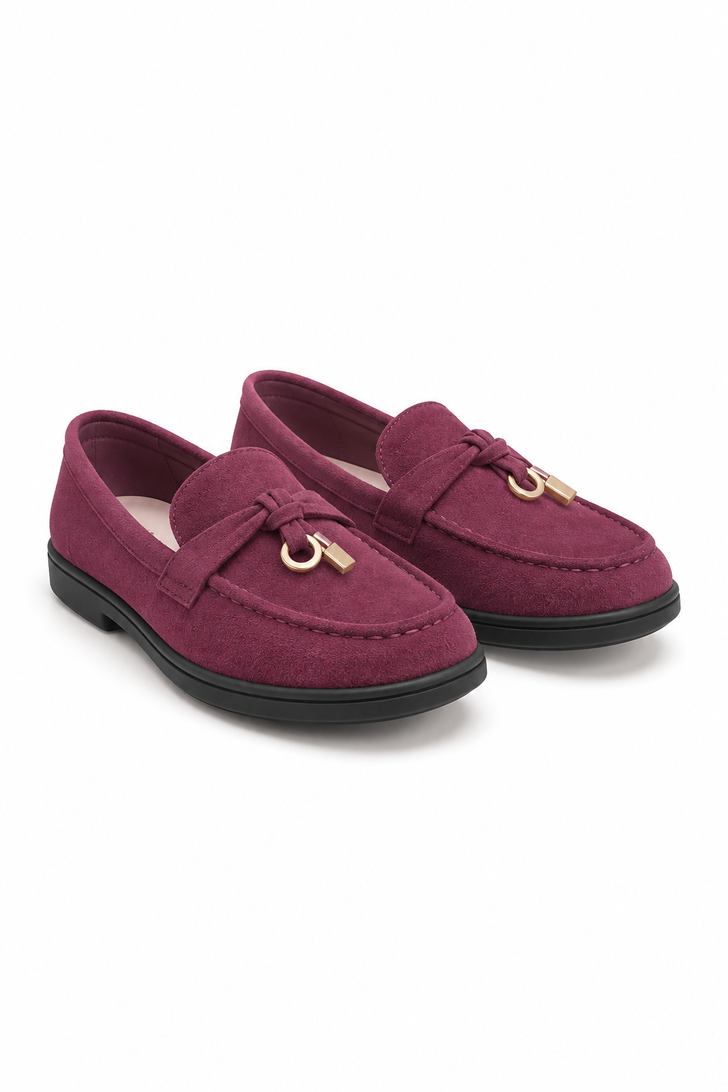 A pair of burgundy suede penny loafers with gold-tone metal horsebit details and black soles, displayed on a clean white background.