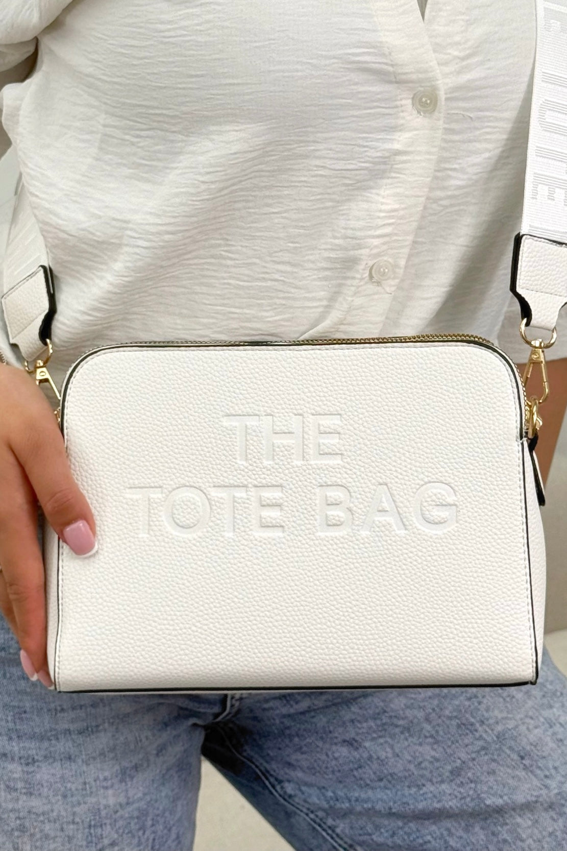 Faux Leather Triple Compartment Everyday Crossbody Tote Bag White finished with structured silhouette with modern embossed slogan detail