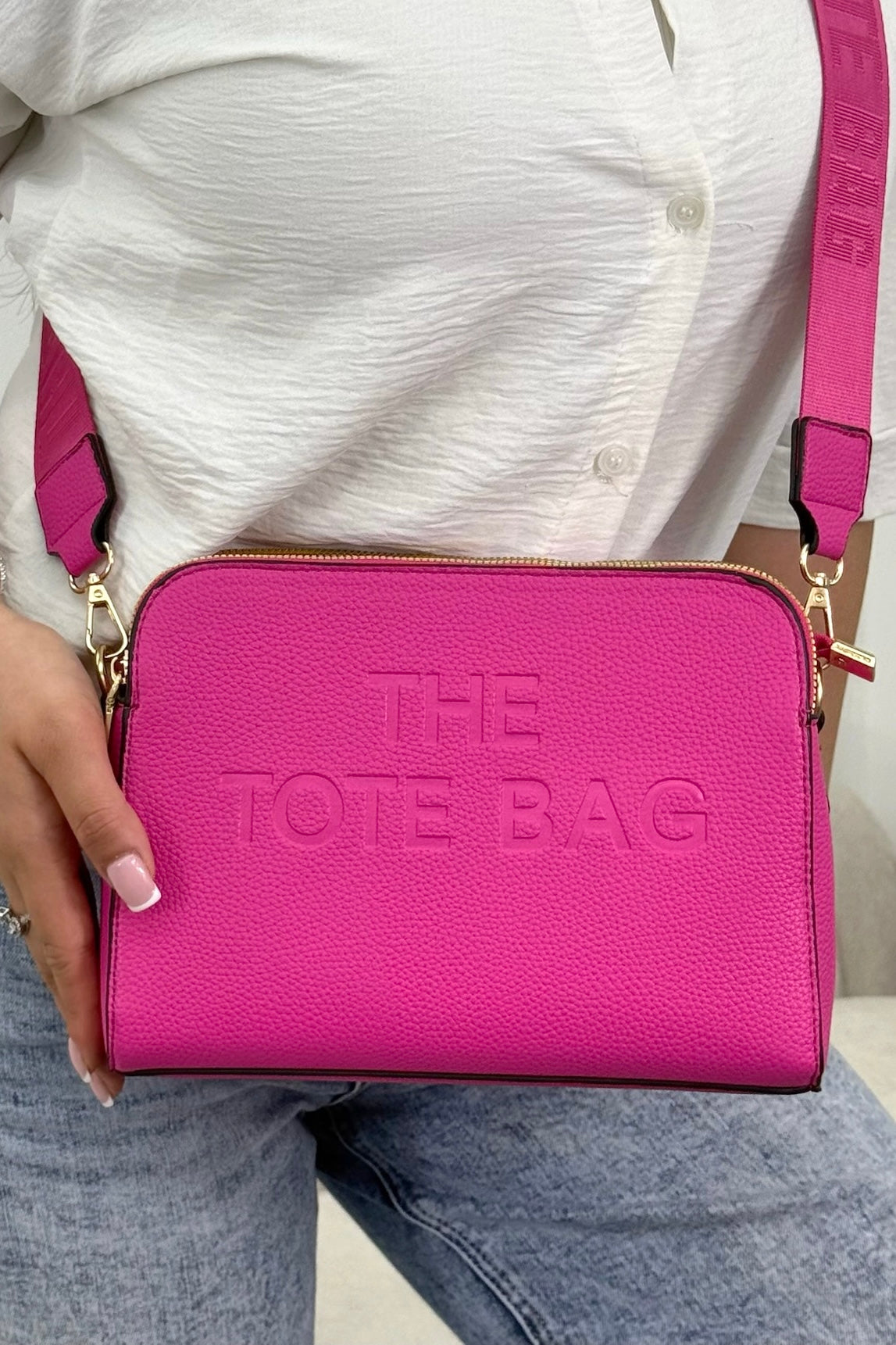 Faux Leather Triple Compartment Everyday Crossbody Tote Bag Hot Pink designed with structured silhouette with modern embossed slogan detail